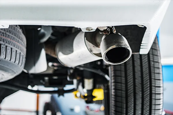 close up of a muffler and tailpipe