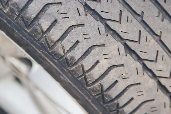 Close-up of worn tire tread