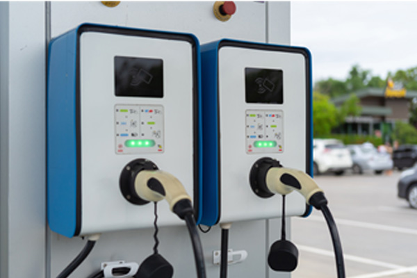 An electric vehicle charging port featuring two EV chargers.