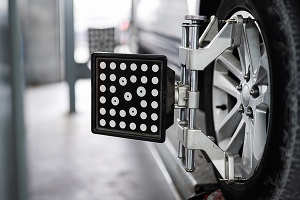 Car wheel on alignment rack